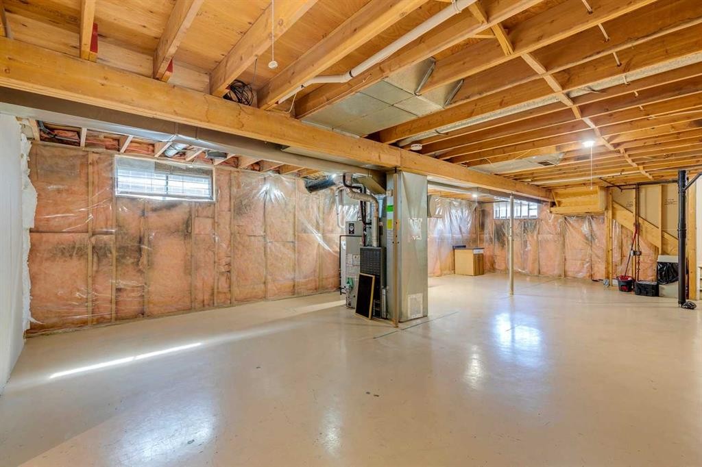 23 Erin Grove Court Se, Calgary, AB - Indoor Photo Showing Basement