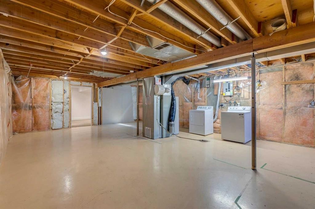 23 Erin Grove Court Se, Calgary, AB - Indoor Photo Showing Basement
