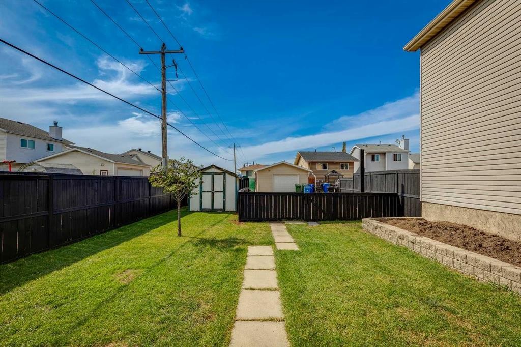 23 Erin Grove Court Se, Calgary, AB - Outdoor With Deck Patio Veranda