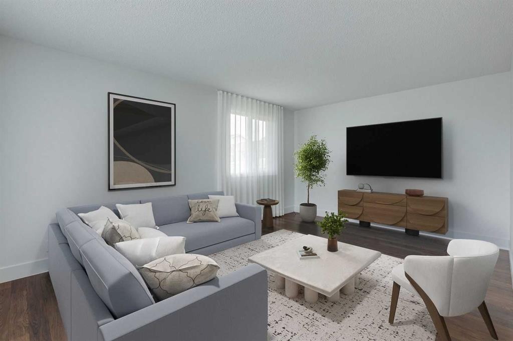 23 Erin Grove Court Se, Calgary, AB - Indoor Photo Showing Living Room