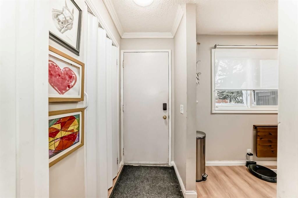 21 Woodfern Road Sw, Calgary, AB - Indoor Photo Showing Other Room