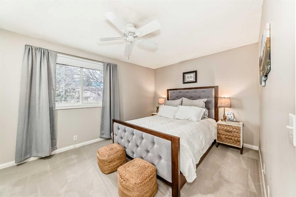 21 Woodfern Road Sw, Calgary, AB - Indoor Photo Showing Bedroom