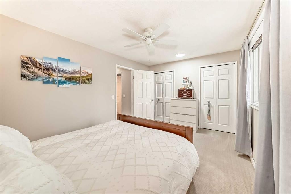 21 Woodfern Road Sw, Calgary, AB - Indoor Photo Showing Bedroom