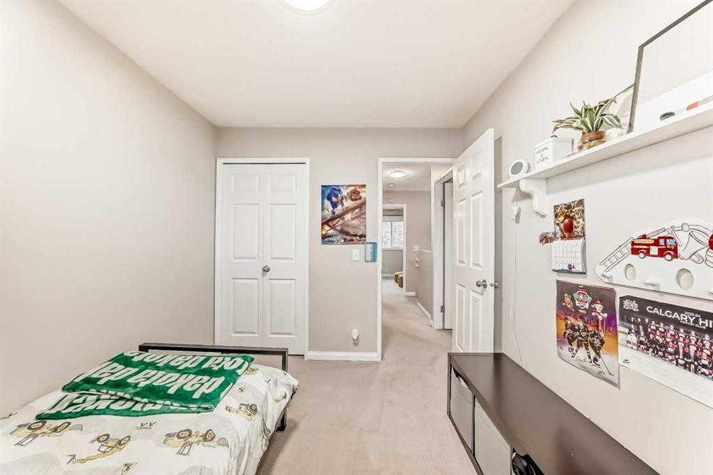 21 Woodfern Road Sw, Calgary, AB - Indoor Photo Showing Bedroom