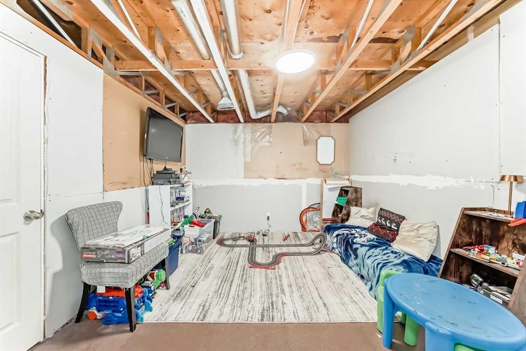 21 Woodfern Road Sw, Calgary, AB - Indoor Photo Showing Other Room
