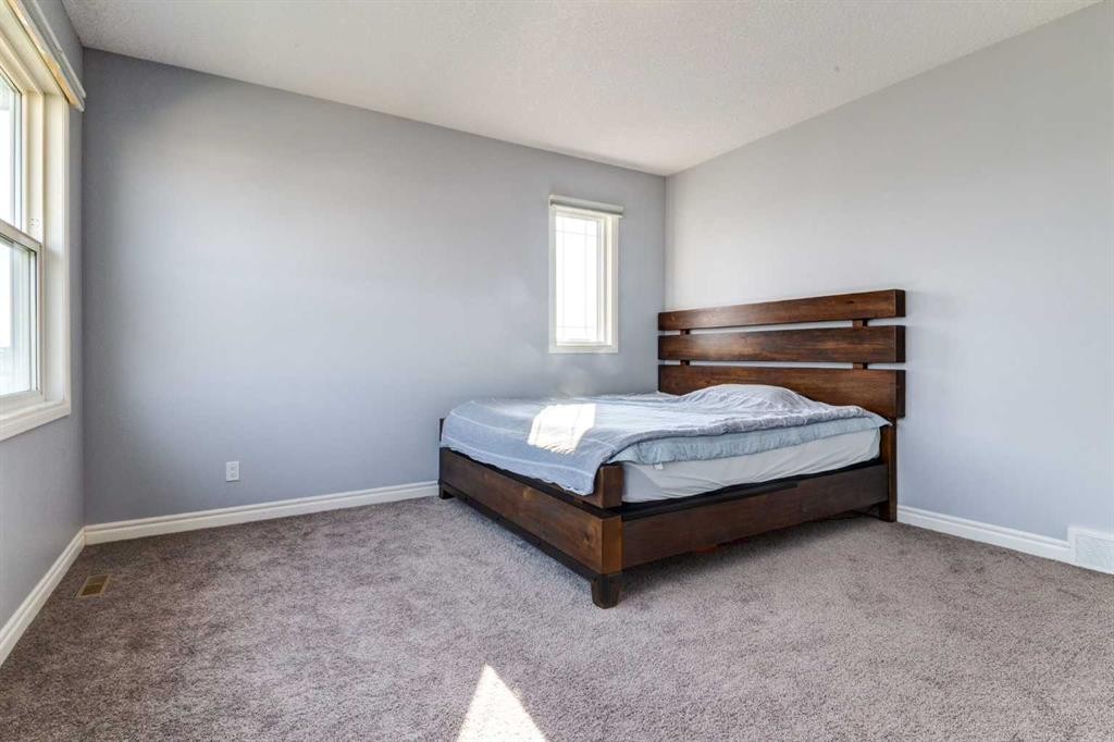 14 Marquis Heights Se, Calgary, AB - Indoor Photo Showing Bedroom