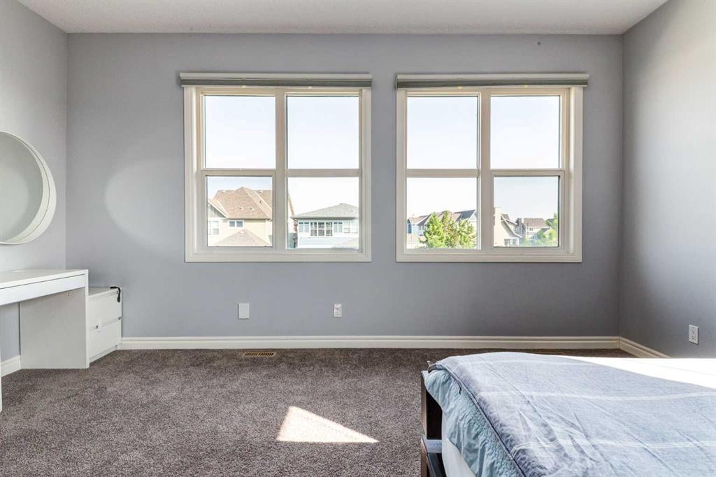 14 Marquis Heights Se, Calgary, AB - Indoor Photo Showing Bedroom