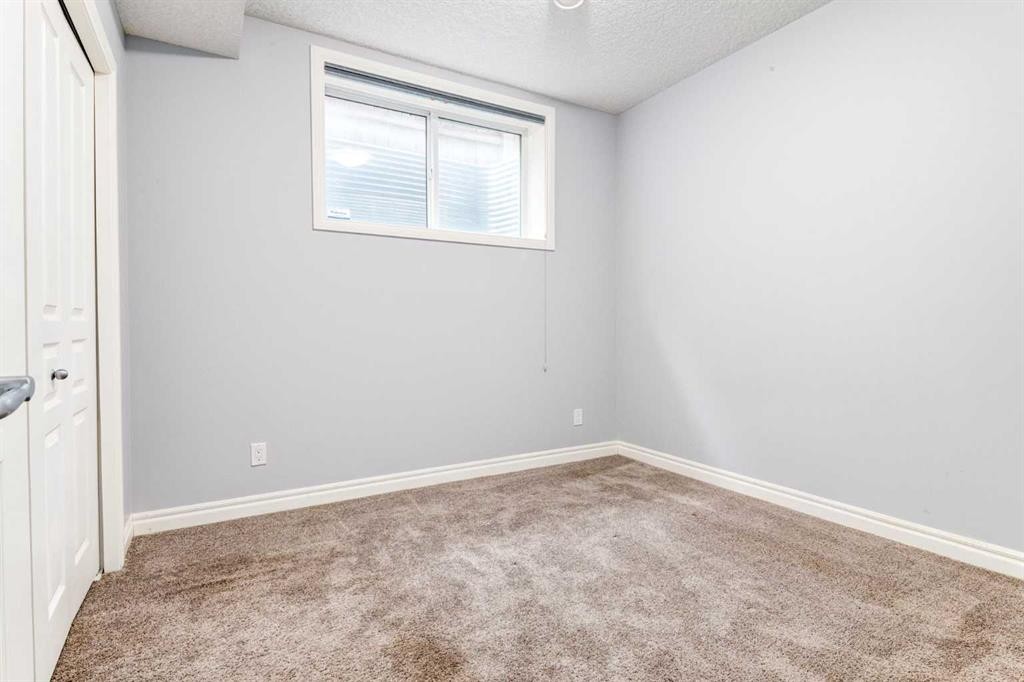 14 Marquis Heights Se, Calgary, AB - Indoor Photo Showing Other Room