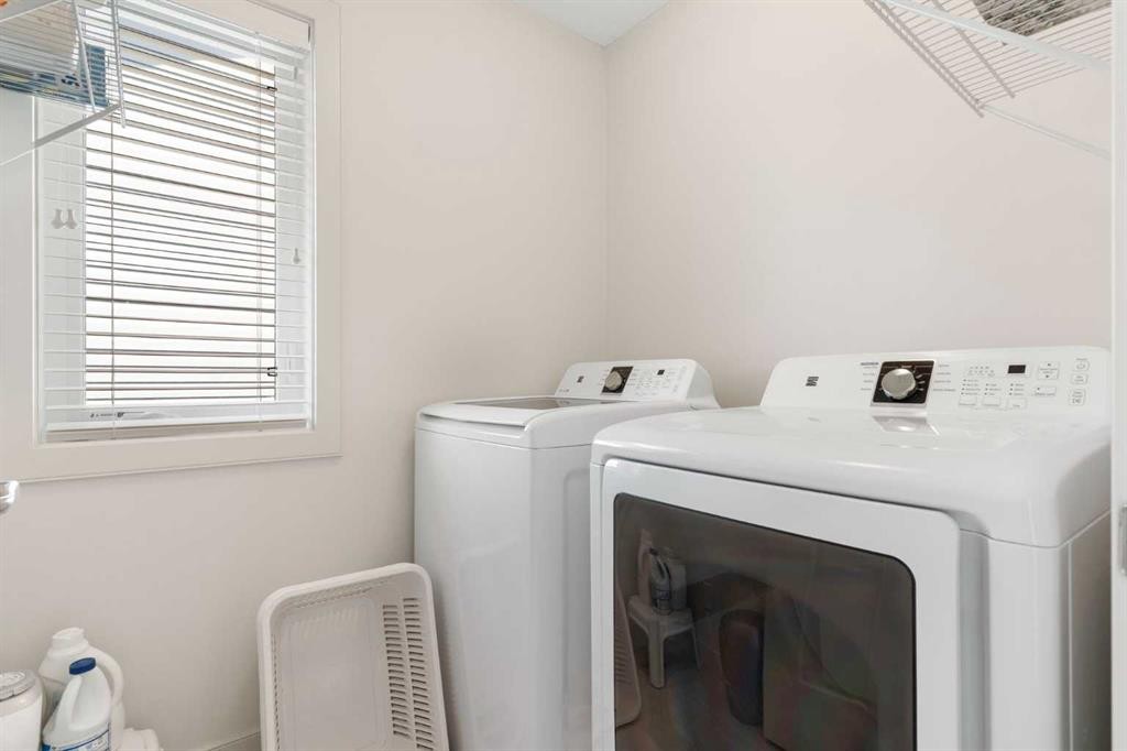 167 Fireside Drive, Cochrane, AB - Indoor Photo Showing Laundry Room