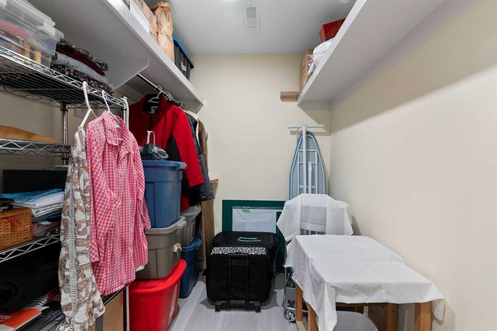 167 Fireside Drive, Cochrane, AB - Indoor With Storage