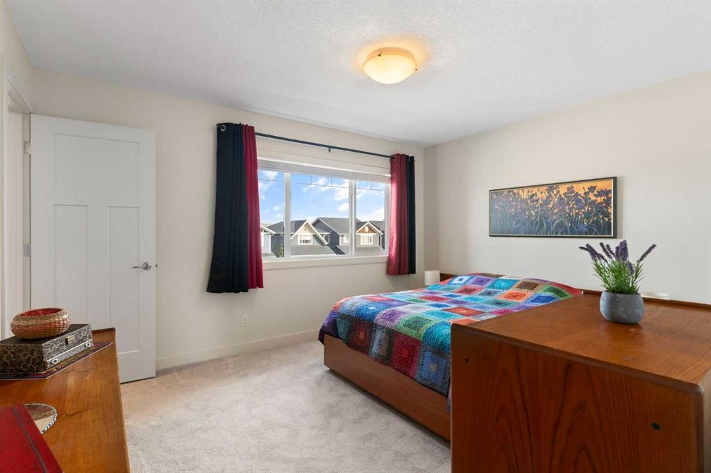 167 Fireside Drive, Cochrane, AB - Indoor Photo Showing Bedroom