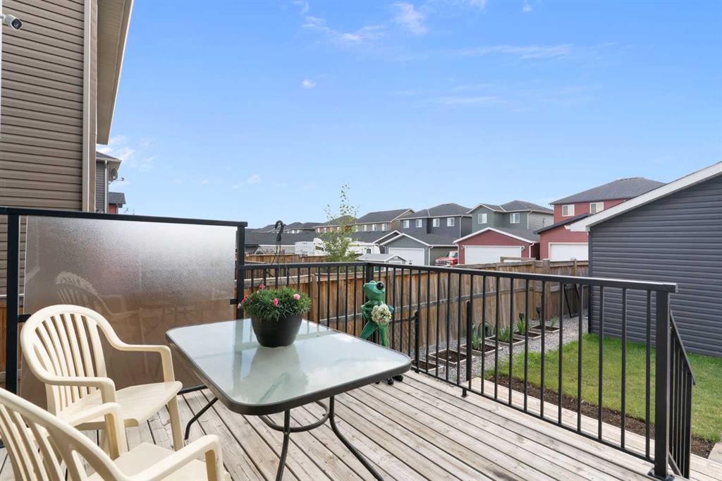 167 Fireside Drive, Cochrane, AB - Outdoor With Deck Patio Veranda With Exterior