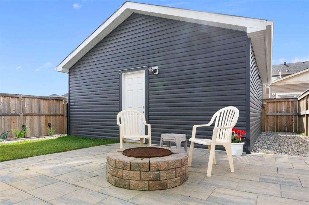 167 Fireside Drive, Cochrane, AB - Outdoor With Deck Patio Veranda With Exterior