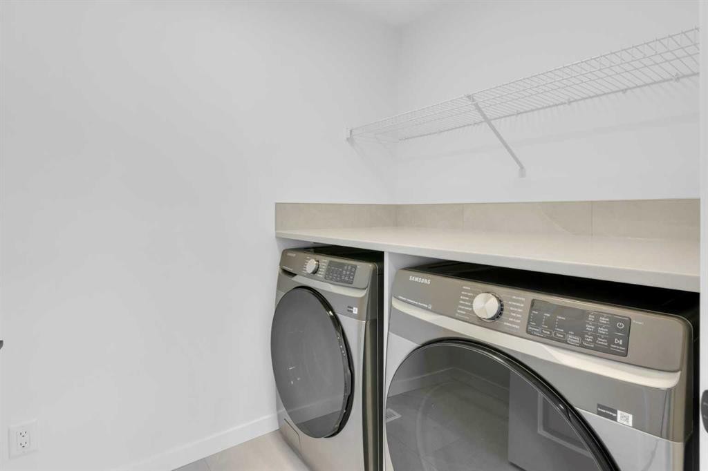 200 Starling Place Nw, Calgary, AB - Indoor Photo Showing Laundry Room
