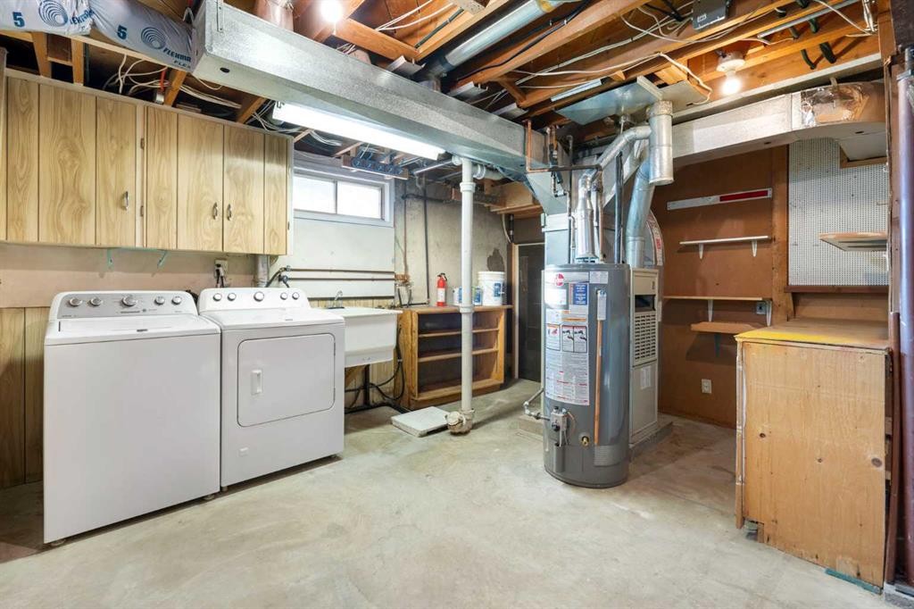 19 Carmangay Crescent Nw, Calgary, AB - Indoor Photo Showing Laundry Room