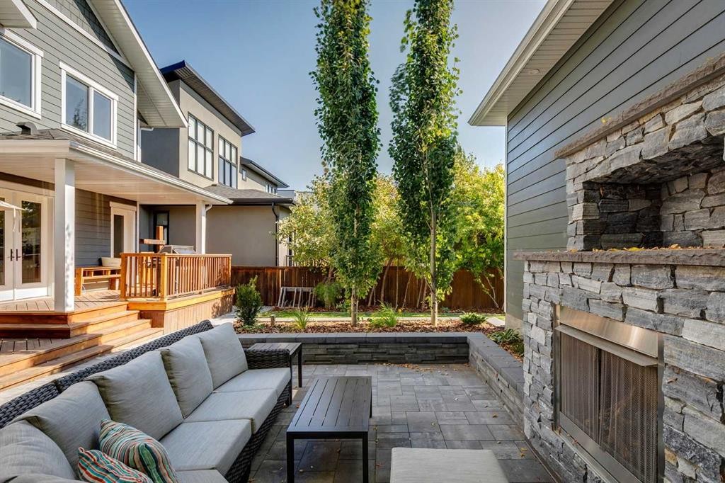 419 47 Avenue Sw, Calgary, AB - Outdoor With Fireplace With Deck Patio Veranda With Exterior