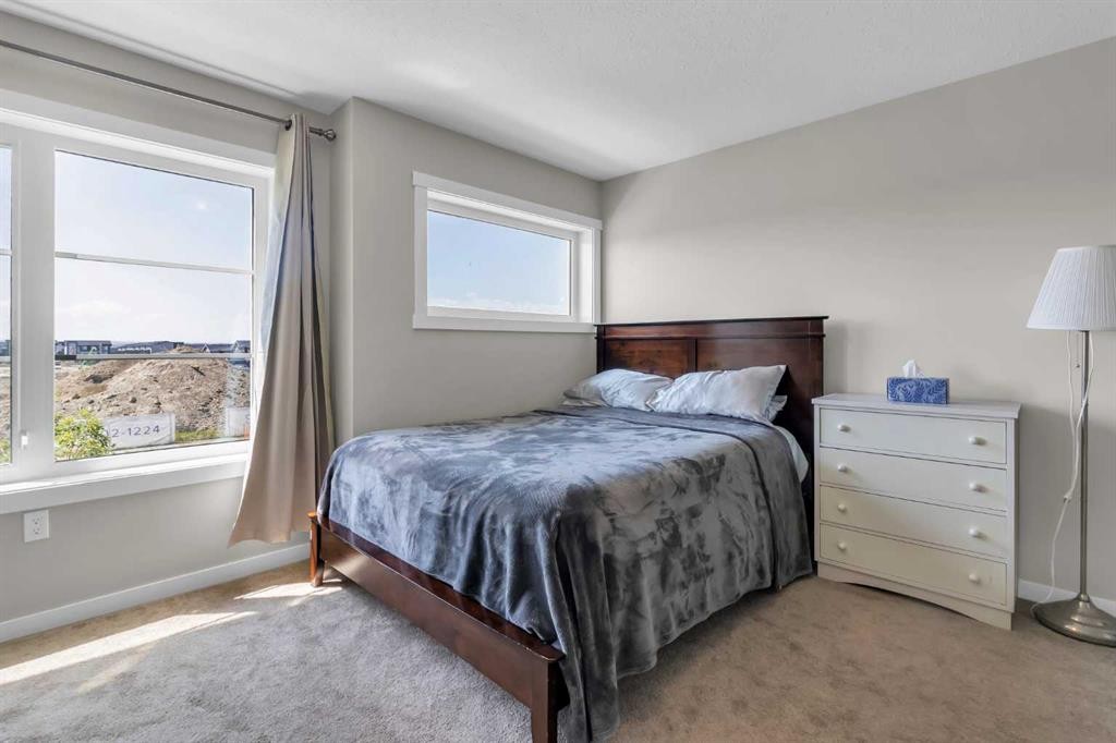 142 Red Embers Gate Ne, Calgary, AB - Indoor Photo Showing Bedroom