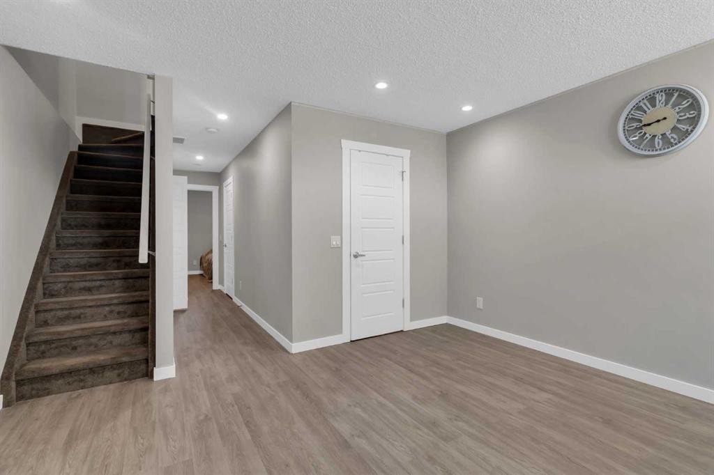 142 Red Embers Gate Ne, Calgary, AB - Indoor Photo Showing Other Room