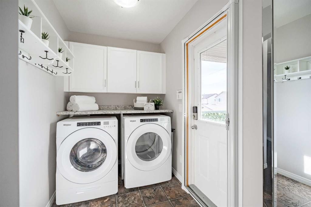 41 Covebrook Close Ne, Calgary, AB - Indoor Photo Showing Laundry Room