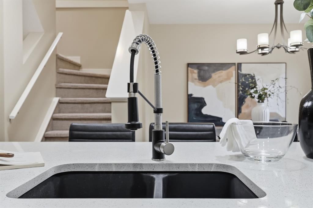 117 Panatella Park Nw, Calgary, AB - Indoor Photo Showing Kitchen With Double Sink