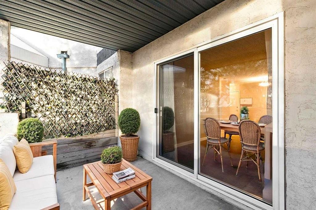 113-10 Dover Point Se, Calgary, AB - Outdoor With Deck Patio Veranda With Exterior