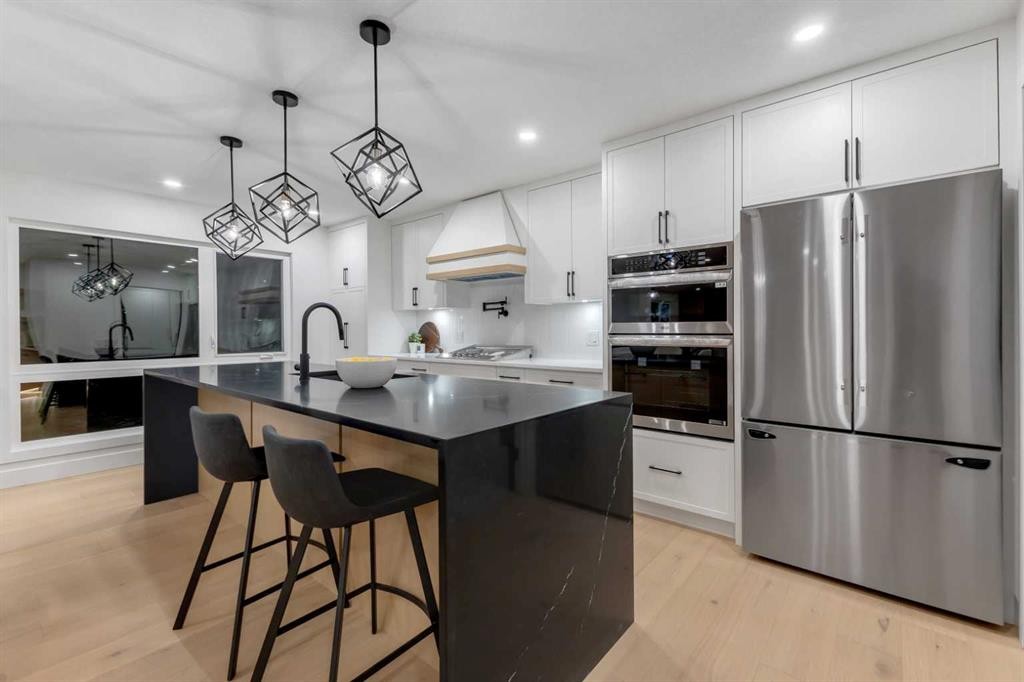 9419 Academy Drive Se, Calgary, AB - Indoor Photo Showing Kitchen With Upgraded Kitchen