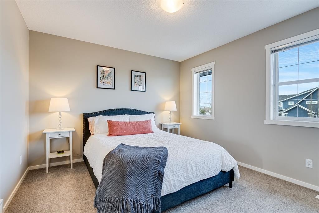 121 Marine Drive Se, Calgary, AB - Indoor Photo Showing Bedroom