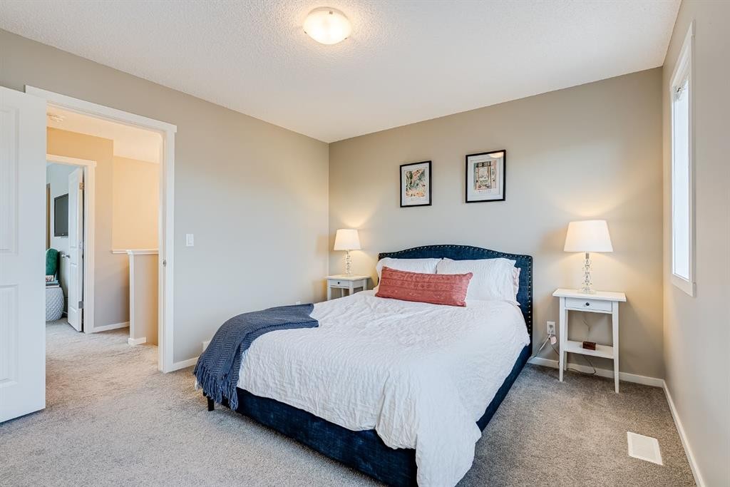 121 Marine Drive Se, Calgary, AB - Indoor Photo Showing Bedroom