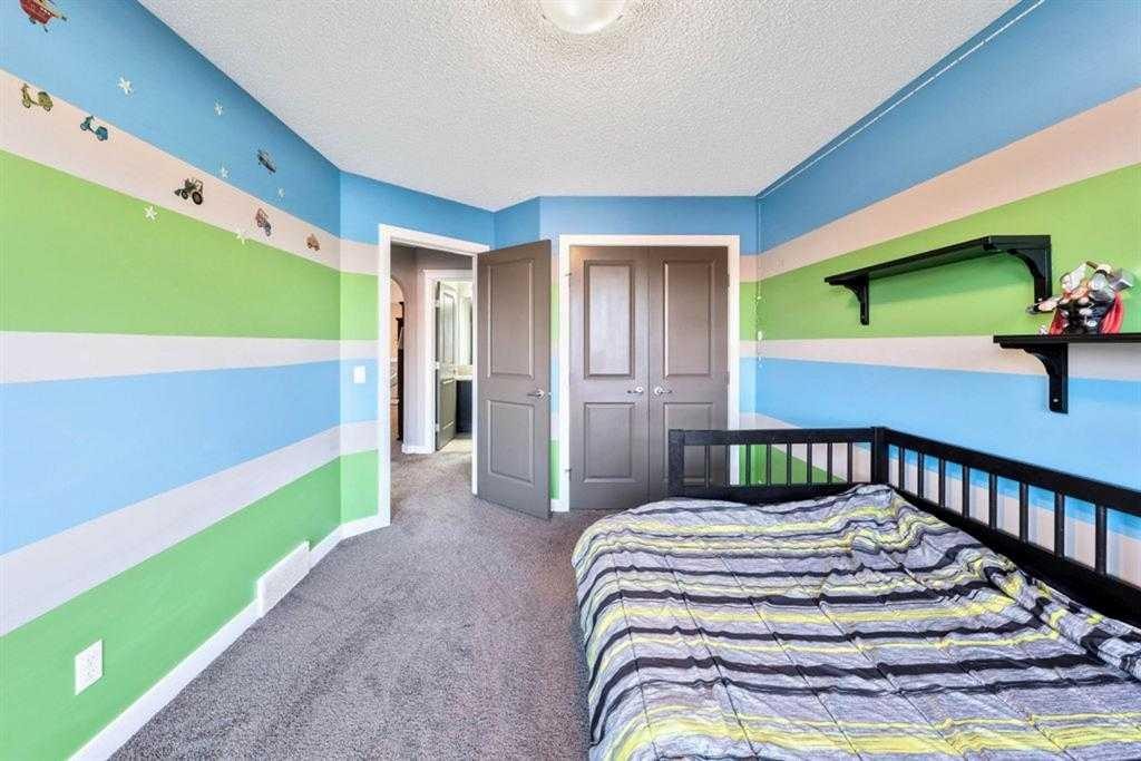 285 Evanspark Gardens Nw, Calgary, AB - Indoor Photo Showing Bedroom