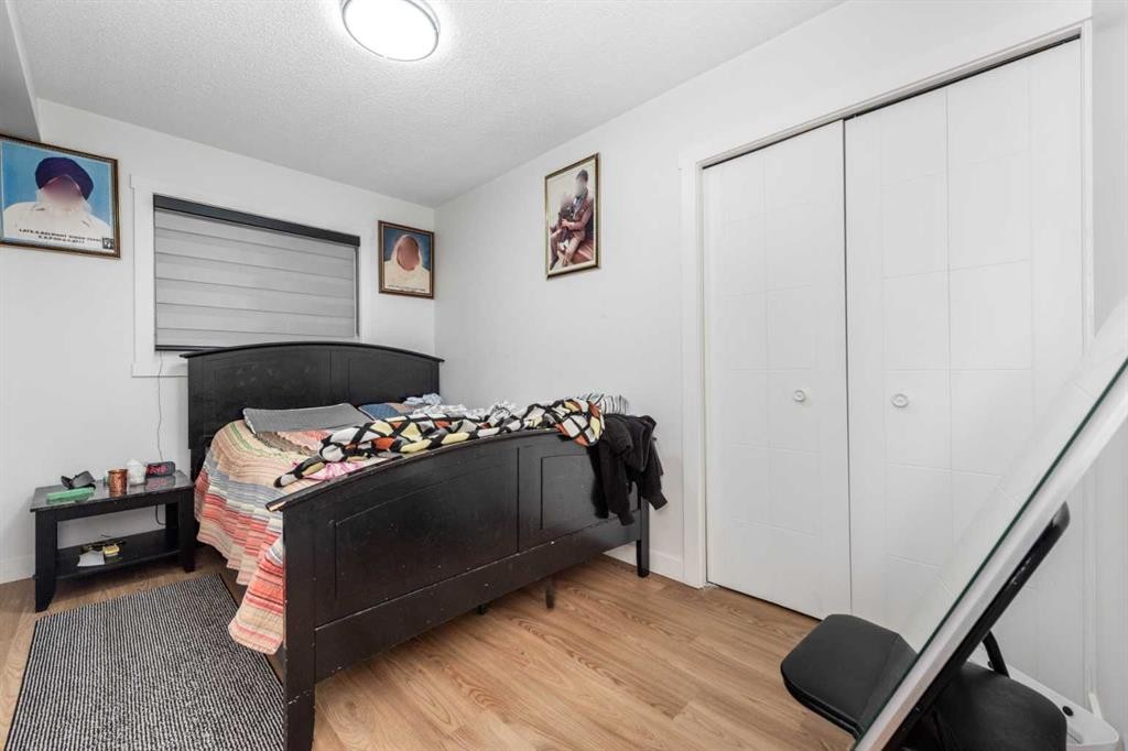 133 Woodbrook Road Sw, Calgary, AB - Indoor Photo Showing Bedroom