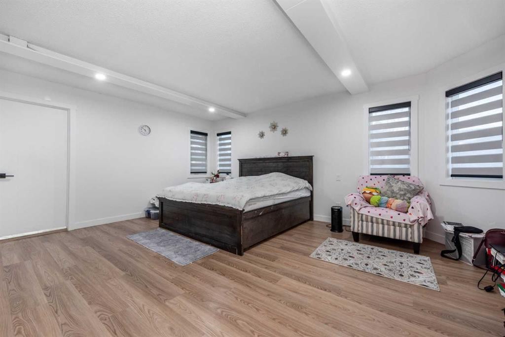 133 Woodbrook Road Sw, Calgary, AB - Indoor Photo Showing Bedroom