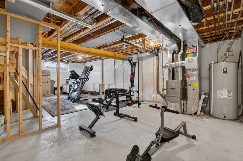 512 Evanston Drive Nw, Calgary, AB - Indoor Photo Showing Gym Room