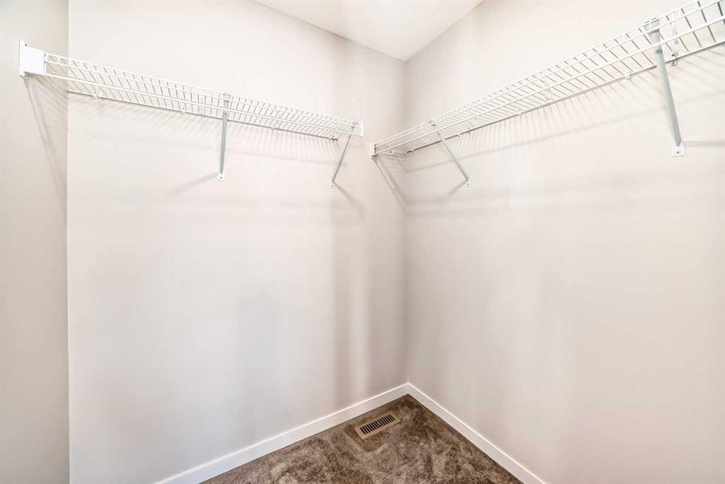 535 Tekarra Drive Nw, Calgary, AB - Indoor With Storage