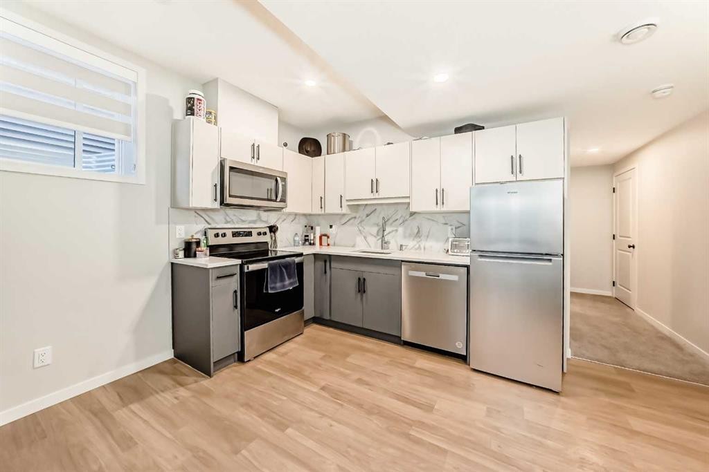 535 Tekarra Drive Nw, Calgary, AB - Indoor Photo Showing Kitchen With Stainless Steel Kitchen