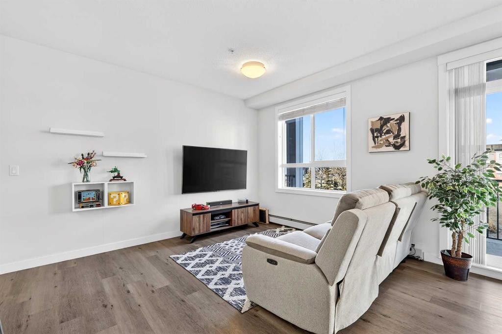 218-30 Walgrove Walk Se, Calgary, AB - Indoor Photo Showing Living Room