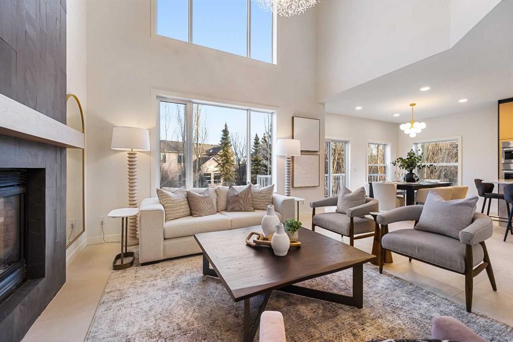 125 Discovery Place Sw, Calgary, AB - Indoor Photo Showing Living Room With Fireplace