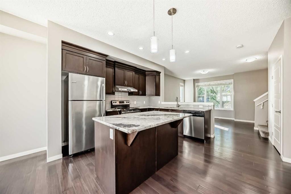 238 Panatella Nw, Calgary, AB - Indoor Photo Showing Kitchen With Upgraded Kitchen