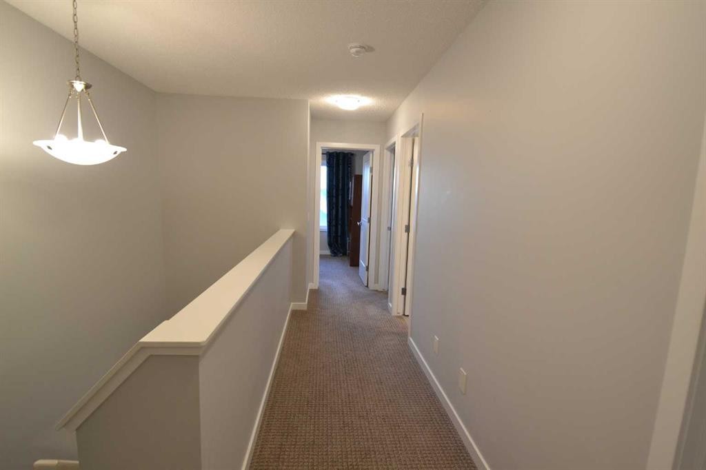 613 Hillcrest Road Sw, Airdrie, AB - Indoor Photo Showing Other Room