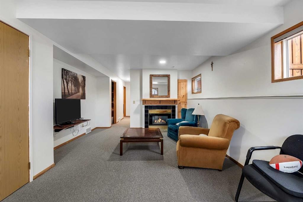 192 Rivercrest Close Se, Calgary, AB - Indoor With Fireplace