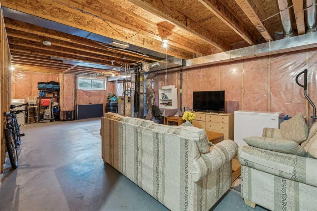 110 Eversyde Common Sw, Calgary, AB - Indoor Photo Showing Basement