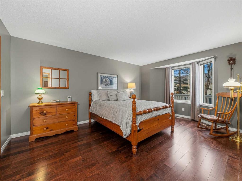 301 Arbour Cliff Close Nw, Calgary, AB - Indoor Photo Showing Bedroom