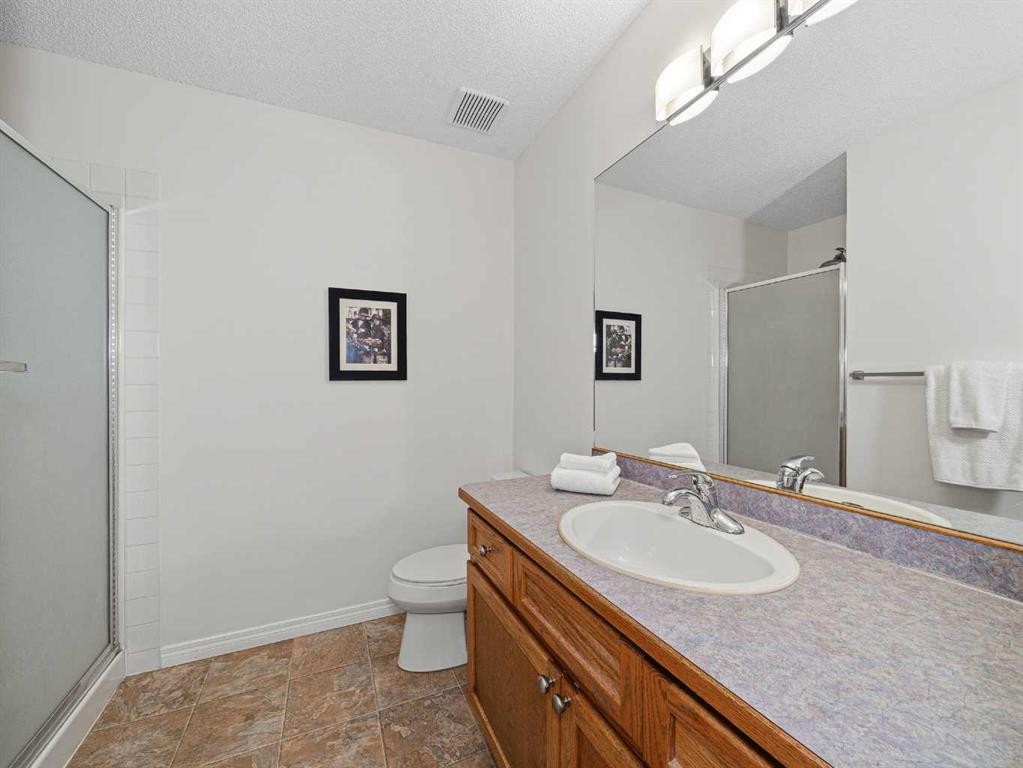 301 Arbour Cliff Close Nw, Calgary, AB - Indoor Photo Showing Bathroom
