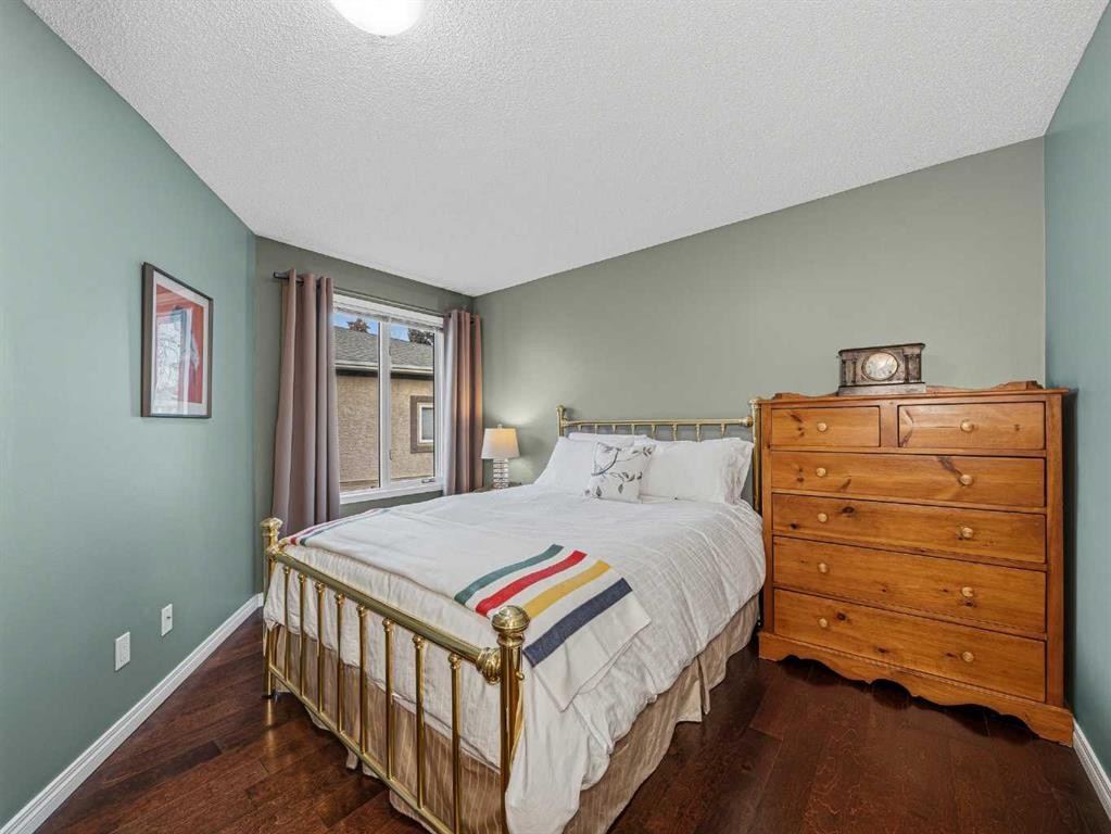 301 Arbour Cliff Close Nw, Calgary, AB - Indoor Photo Showing Bedroom