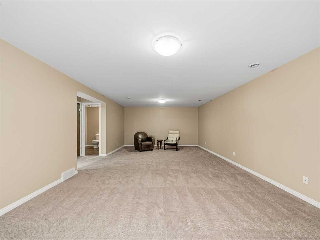 301 Arbour Cliff Close Nw, Calgary, AB - Indoor Photo Showing Other Room