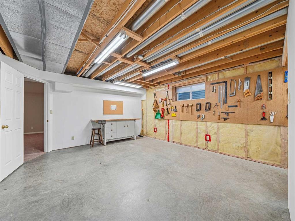 301 Arbour Cliff Close Nw, Calgary, AB - Indoor Photo Showing Basement