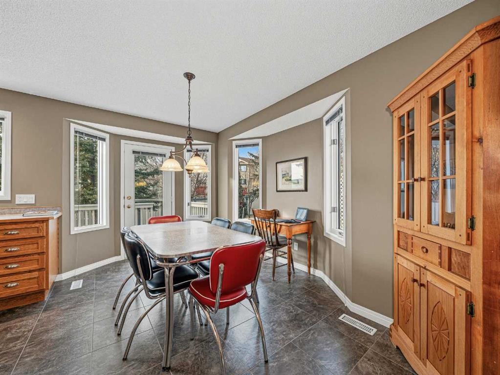 301 Arbour Cliff Close Nw, Calgary, AB - Indoor Photo Showing Dining Room