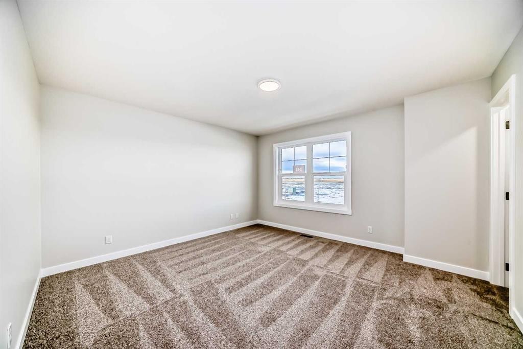 241 Bridgeport Gate, Chestermere, AB - Indoor Photo Showing Other Room