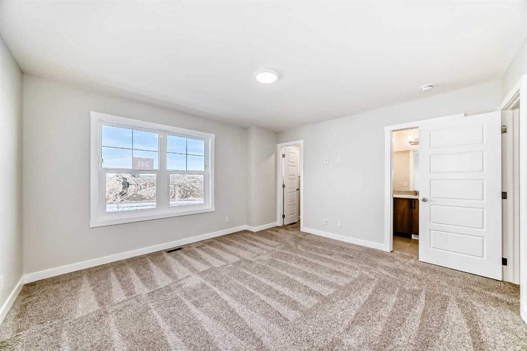 241 Bridgeport Gate, Chestermere, AB - Indoor Photo Showing Other Room