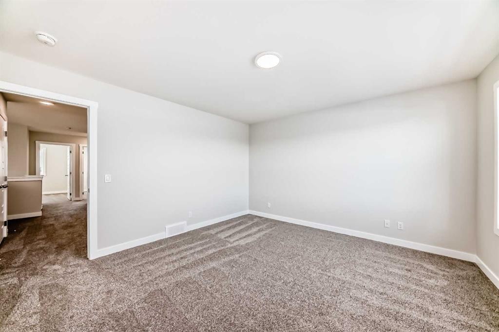 241 Bridgeport Gate, Chestermere, AB - Indoor Photo Showing Other Room