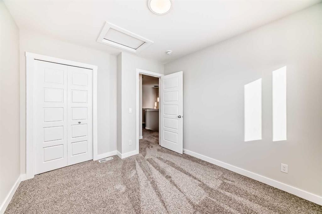 241 Bridgeport Gate, Chestermere, AB - Indoor Photo Showing Other Room